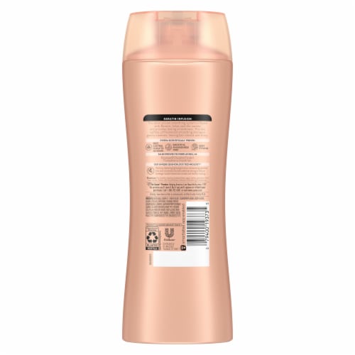 Suave Professionals Keratin Infusion Smoothing Shampoo Perspective: left