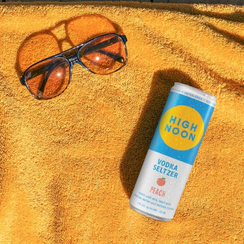 High Noon Peach Vodka Hard Seltzer Perspective: left