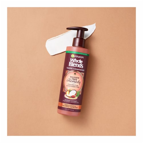 Garnier Whole Blends Remedy Coconut Oil And Cocoa Butter Conditioner Perspective: left