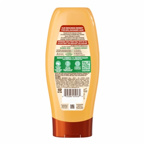 Garnier Whole Blends Honey Treasures Repairing Conditioner for Dry, Damaged Hair Perspective: left