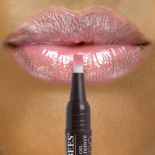 Burt's Bees Natural Moisturizing Whispering Orchid Tinted Lip Oil Pen Perspective: left