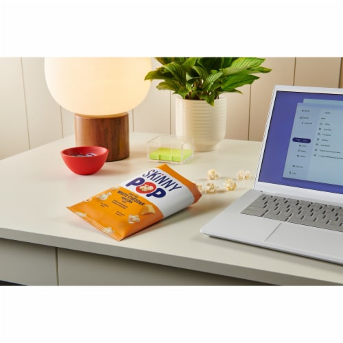 SkinnyPop Dairy-Free White Cheddar Popcorn, 0.5 oz Snack-Size Bags, 10 Count Perspective: left