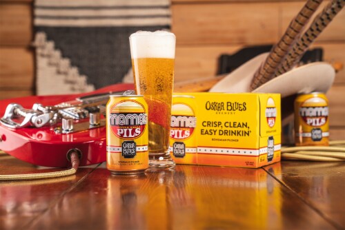 Oskar Blues Mama's Little Yella Pils Bohemian Pilsner Craft Beer Perspective: left