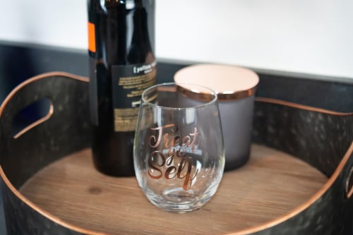 Parks and Recreation Treat Yo Self Stemless Wine Glass | Pink Perspective: left
