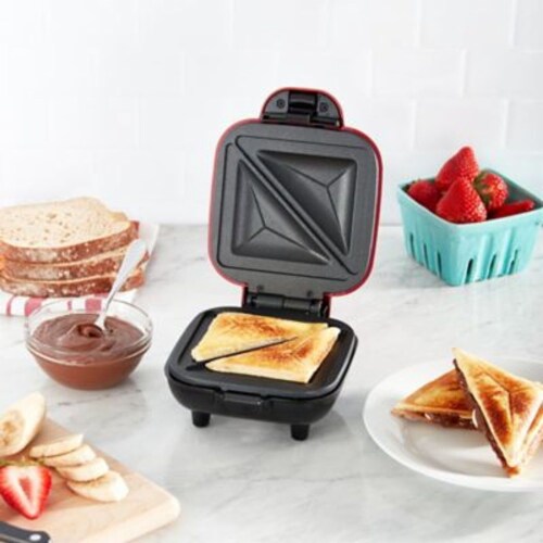 Dash® Pocket Sandwich Maker in Red Perspective: left
