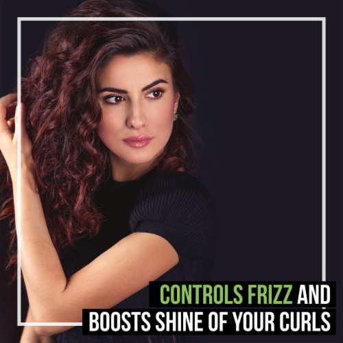 TRESemme® Flawless Curls Coconut & Avocado Hydrating Oil Perspective: right