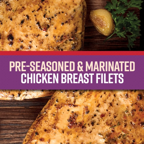 Tyson® Chicken Breast Filets Classic Garlic & Herb Freshly Seasoned Boneless Skinless Ready to Cook Perspective: right
