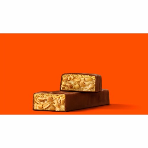 REESE'S Crunchy Peanut Chocolate Peanut Butter and Peanuts King Size Candy Bar Perspective: right