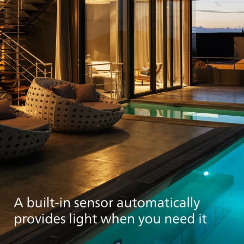 Philips Dusk to Dawn, 60Watt Replacement, A19 LED, Soft White, Clear Glass, Non-Dimmable Light Bulb Perspective: right