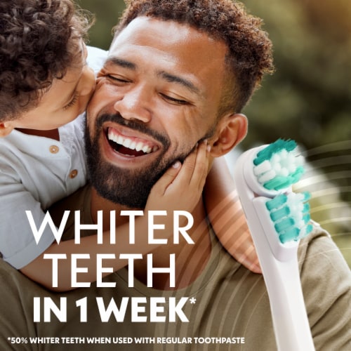 Spinbrush Pro Whiten Medium Bristles Coral Battery Powered Electric Toothbrush Perspective: right