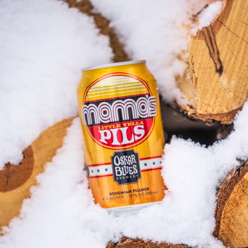 Oskar Blues Mama's Little Yella Pils Bohemian Pilsner Craft Beer Perspective: right