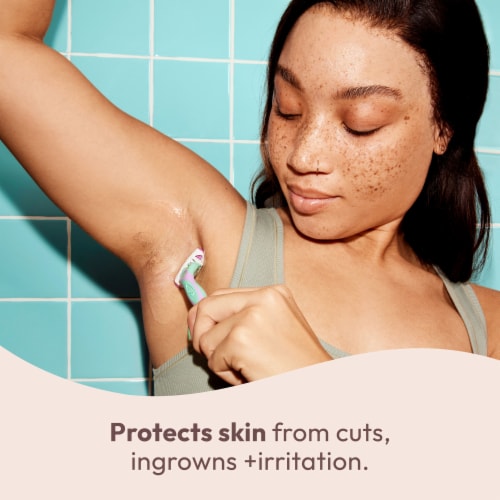 Skintimate 2 in 1 Shave Oil + Moisturizer Protects & Smooths Coconut Bliss Scent Perspective: right