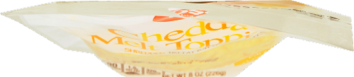 P$$t... Imitation Shredded Cheddar Cheese Perspective: top