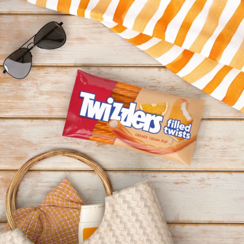 TWIZZLERS Filled Twists Orange Cream Pop Flavored Licorice Style Chewy Candy Bag Perspective: top