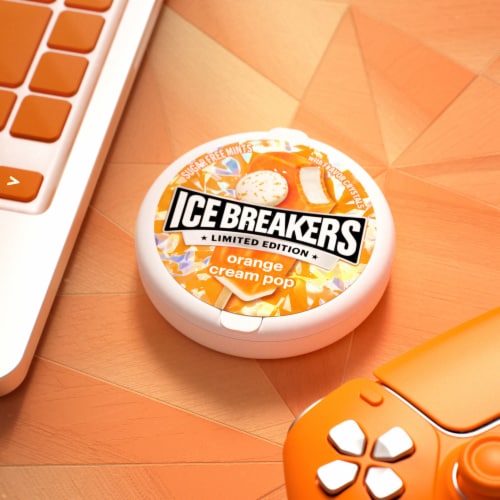 ICE BREAKERS Orange Cream Pop Sugar Free Mints Tin Perspective: top