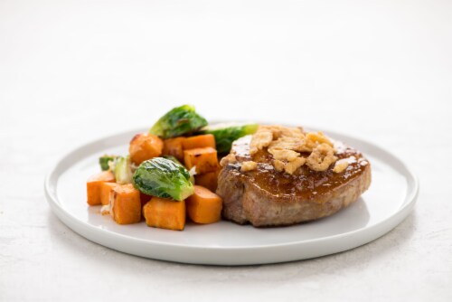 Home Chef Oven-Ready Chili Brown Sugar Pork Chop with Roasted Sweet Potatoes and Brussels Sprouts Perspective: top