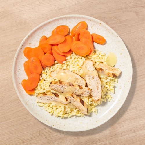 Home Chef Heat And Eat Lemon Pepper Chicken with Rice And Honey Roasted Carrots Perspective: top