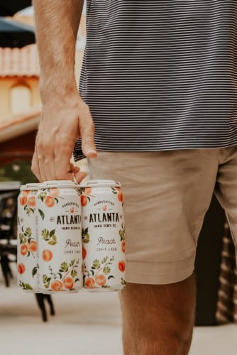 Atlanta® Hard Cider Seasonal Peach Craft Cider Cans Perspective: top