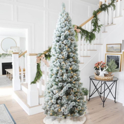 Glitzhome 9 Feet Pre-Lit Flocked Pencil Pine Faux Christmas Tree with 500 Warm White Lights Perspective: top