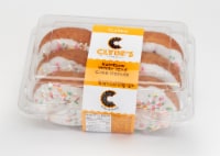 Clyde’s Donuts Rainbow White Iced Cake Donuts