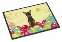 Carolines Treasures BB6028MAT Easter Eggs Manchester Terrier Doormat 18x27