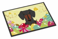 Carolines Treasures BB6132MAT Easter Eggs Dachshund Black Tan Doormat 18x27