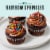 Bakery Fresh Chocolate Cupcakes with Whipped Icing Perspective: back