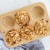 Nordic Ware Compact Ovenware Muffin Pan Perspective: back