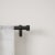 Umbra® Cappa 66 to 120-Inch Adjustable Curtain Rod in Brushed Black Perspective: back