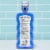 ACT Restoring Anticavity Fluoride With Alcohol Cool Mint Mouthwash Perspective: back