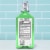 ACT Total Care Anticavity Fluoride Mouthwash with Zero Alcohol Fresh Mint Perspective: back