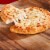 DiGiorno Four Cheese Frozen Personal Pizza on a Hand-Tossed Style Traditional Crust Perspective: back