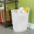 Sterilite White Oval Trash Can Perspective: back