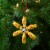 Northlight 4 Yellow and Red Tootsie Roll Sugar Daddy Lollipop Snowflake Christmas Ornament Perspective: back