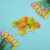 Northlight Club Pack of 12 Orange and Green Spring Easter Egg Ornaments 2.5 Perspective: back