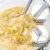 Zulay Kitchen Potato Masher with Premium Silicone-Coated Stainless-Steel Design - Yellow Perspective: back