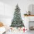 Northlight 6.5' Pre-Lit Medium Flocked Winema Pine Artificial Christmas Tree - Clear Lights Perspective: back