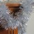 Northlight 50' Traditional Shiny Silver 6 Ply Christmas Foil Tinsel Garland - Unlit Perspective: back