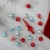 Northlight 19ct Red and Blue Frosted Glass Christmas Ornaments and Tree Topper Set 5.25 Perspective: back
