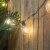 Northlight 10ct Warm White LED G50 Globe Patio Lights, 10ft Green Wire Perspective: back