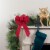 Northlight 14  x 9  Red Glittered Poinsettia 6 Loop Christmas Bow Decoration Perspective: back