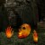 Northlight 8.5 Lighted Orange Skull and Hands Outdoor Halloween Decoration - 4ft Black Wire Perspective: back