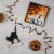 Northlight 50-Count Yellow and Orange Candy Corn Mini Halloween Light Set, Black Wire Perspective: back