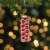 Northlight 3 Red Ribbon Candy Glass Christmas Ornament Perspective: back