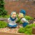 Gardens Alive! Minature Kissing Dutch Couple Garden Statues Perspective: back