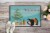 Sheba Guinea Pig Merry Christmas Indoor or Outdoor Mat 18x27 Perspective: back