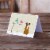 Christmas Presents between Friends Boxer - Flashy Fawn Greeting Cards and Envelo Perspective: back