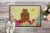 Carolines Treasures BB6086MAT Easter Eggs Shih Tzu Silver Chocolate Doormat 18x Perspective: back