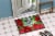 Carolines Treasures CK1356MAT Dalmatian Puppy Poinsettas Doormat 18x27 Perspective: back