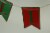 Red and Green Enamel Metal Believe Banner Christmas Rope Garland Holiday Decor Perspective: back